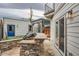 Backyard featuring a stone grill, custom pergola, and modern patio at 1819 W 32Nd Ave, Denver, CO 80211
