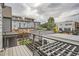 Balcony features a cozy outdoor living space with a view of the neighborhood at 1819 W 32Nd Ave, Denver, CO 80211