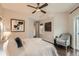 Bedroom with hardwood floors, a ceiling fan, and large windows that provide plenty of light at 1819 W 32Nd Ave, Denver, CO 80211