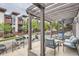 Inviting home exterior with a covered porch, seating, and a charming view of the neighborhood at 1819 W 32Nd Ave, Denver, CO 80211