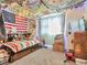 Colorful bedroom with a unique ceiling and plenty of storage at 12246 E 2Nd Dr, Aurora, CO 80011