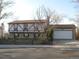 Ranch style home with attached garage and landscaping at 16651 E Arizona Pl, Aurora, CO 80017