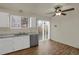 Bright kitchen featuring stainless steel appliances, marble countertops, and a sliding glass door at 16651 E Arizona Pl, Aurora, CO 80017
