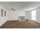 Living room featuring a ceiling fan and loft view at 16651 E Arizona Pl, Aurora, CO 80017