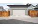 Detached two-car garage with concrete driveway and convenient access at 9976 E 63Rd Ave, Denver, CO 80238