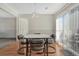 Bright dining area with wood floors and sliding glass doors at 5160 Hannibal St, Denver, CO 80239