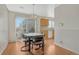 Bright dining area with wood floors and sliding glass doors at 5160 Hannibal St, Denver, CO 80239
