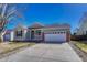 Charming single-Gathering home featuring a two-car garage and a welcoming front porch at 5160 Hannibal St, Denver, CO 80239
