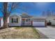Charming single-Gathering home featuring a two-car garage and a welcoming front porch at 5160 Hannibal St, Denver, CO 80239