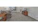 Spacious living room with neutral colors and plush carpet at 5160 Hannibal St, Denver, CO 80239