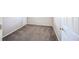 Carpeted bedroom with a closet and one window at 11305 W Crestline Dr, Littleton, CO 80127