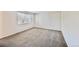Bedroom with carpet, window and neutral walls at 11305 W Crestline Dr, Littleton, CO 80127