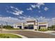 Commercial building with modern architecture, landscaping, and ample parking at 599 Fall River Ct, Brighton, CO 80601