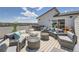 Comfortable rooftop deck providing lounge seating and an outdoor dining area at 6880 Bryant Way, Denver, CO 80221