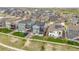 A beautiful aerial view shows the neighborhood, surrounding the lovely home at 7012 S Undergrove Way, Aurora, CO 80016