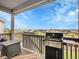 Outdoor patio featuring a grill and a stunning view of the neighborhood at 7012 S Undergrove Way, Aurora, CO 80016