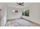 Bright bedroom with hardwood floors and many windows at 1304 Snowberry # 204, Louisville, CO 80027