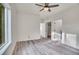 Empty bedroom with wood floors and view of other rooms at 1304 Snowberry # 204, Louisville, CO 80027