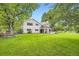 Enjoy this large backyard with an expansive lawn, a deck, and a covered patio at 5475 W Ottawa Ave, Littleton, CO 80128