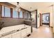 Bright bathroom with a soaking tub, tiled shower, and natural light at 5475 W Ottawa Ave, Littleton, CO 80128