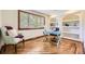 Stylish office space with built-in shelving, hardwood floors, and ample natural light at 5475 W Ottawa Ave, Littleton, CO 80128