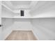 Organized closet with custom shelving for storage at 710 S Clinton St # 6A, Denver, CO 80247
