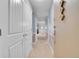 Foyer featuring neutral walls, tile flooring, and white trim at 710 S Clinton St # 6A, Denver, CO 80247