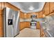 Bright kitchen featuring stainless steel appliances and granite counters at 710 S Clinton St # 6A, Denver, CO 80247