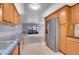 Bright kitchen with stainless appliances and an open floor plan at 710 S Clinton St # 6A, Denver, CO 80247