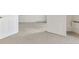 Bedroom with neutral carpet with light walls and white doors and trim, and an air conditioner at 14001 E Marina Dr # 606, Aurora, CO 80014