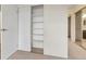 Ample closet space with mirrored doors and built-in shelving at 14001 E Marina Dr # 606, Aurora, CO 80014