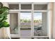 Relaxing balcony with wooden deck and seating, offering city views and fresh air at 333 S Monroe St # 211, Denver, CO 80209