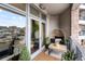 Cozy balcony featuring comfortable seating and stylish decor, perfect for relaxing at 333 S Monroe St # 211, Denver, CO 80209