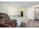 Bedroom featuring carpet and a closet at 17505 E Mansfield Ave # 1411L, Aurora, CO 80013