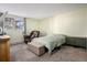 Bedroom featuring carpet and a window with a nice view at 17505 E Mansfield Ave # 1411L, Aurora, CO 80013