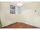 Well-lit dining area showcasing hardwood flooring and bright windows, perfect for Gathering meals at 17505 E Mansfield Ave # 1411L, Aurora, CO 80013