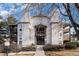 A charming exterior elevation features attractive architecture and well-maintained landscaping at 17505 E Mansfield Ave # 1411L, Aurora, CO 80013