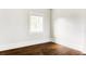 Bright bedroom with hardwood floors and neutral walls at 3044 W 29Th Ave, Denver, CO 80211