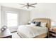 Spacious bedroom with a comfortable bed and large window at 3044 W 29Th Ave, Denver, CO 80211