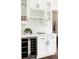 White kitchen cabinets with wine rack and beverage center at 3044 W 29Th Ave, Denver, CO 80211