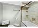 Bright bathroom featuring a tub-shower combo with tile surround, providing a clean and modern space at 23735 Bluestem Dr, Golden, CO 80401