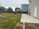 Spacious backyard with newly installed sod and a concrete patio, perfect for entertaining at 1286 Finch Ave, Brighton, CO 80601