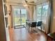 Cozy dining area with natural light and sliding glass doors to the backyard, great for Gathering meals and entertaining at 1286 Finch Ave, Brighton, CO 80601