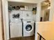 Convenient laundry area with washer and dryer, maximizing space for efficient household chores at 1286 Finch Ave, Brighton, CO 80601