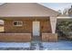 Inviting front porch with brick accents, neutral paint and visible house number at 1330 E 90Th Ave, Thornton, CO 80229