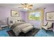 Serene bedroom with plush carpeting, ceiling fan, and a view of the outdoors at 8840 Niwot Rd, Niwot, CO 80503