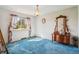 Unstaged bedroom with a large window showing great light and blue carpeting at 8840 Niwot Rd, Niwot, CO 80503