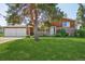 Charming two-story brick home with a two-car garage and a well-maintained front yard at 8840 Niwot Rd, Niwot, CO 80503