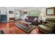 Bright living room with a staircase, front door, and classic decor at 8840 Niwot Rd, Niwot, CO 80503