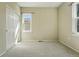 Bright bedroom featuring neutral walls and carpeted floors at 12925 Grant Cir # A, Thornton, CO 80241